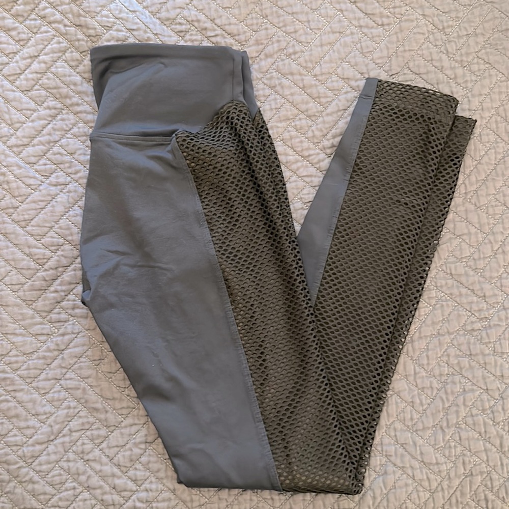 Koral leggings in navy with black mesh sides in size small